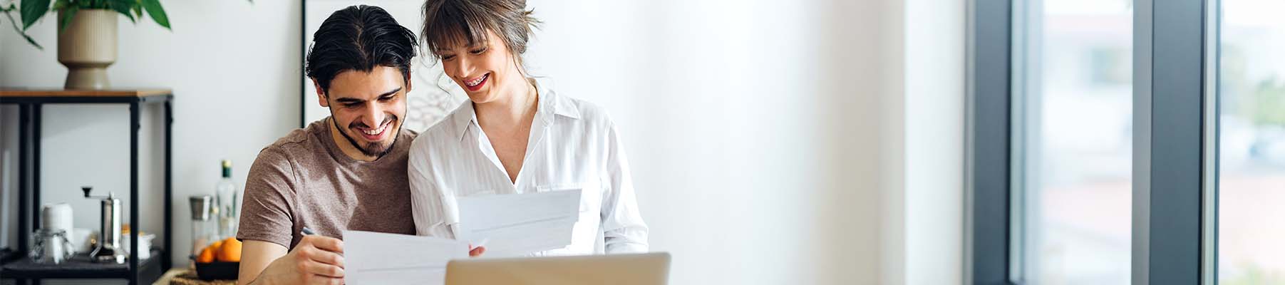Young couple looking over their finances