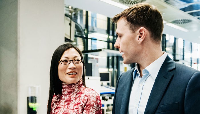 Business owner talking with investor