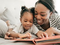 Mother and daughter reading