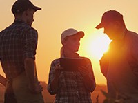 Nature Conservancy | rep talking to a farmer