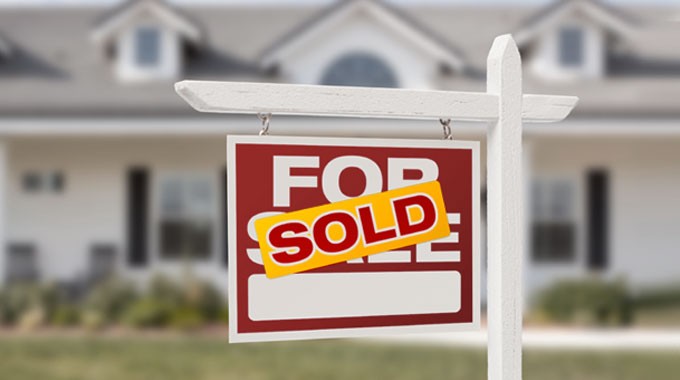 For sale sign marked sold